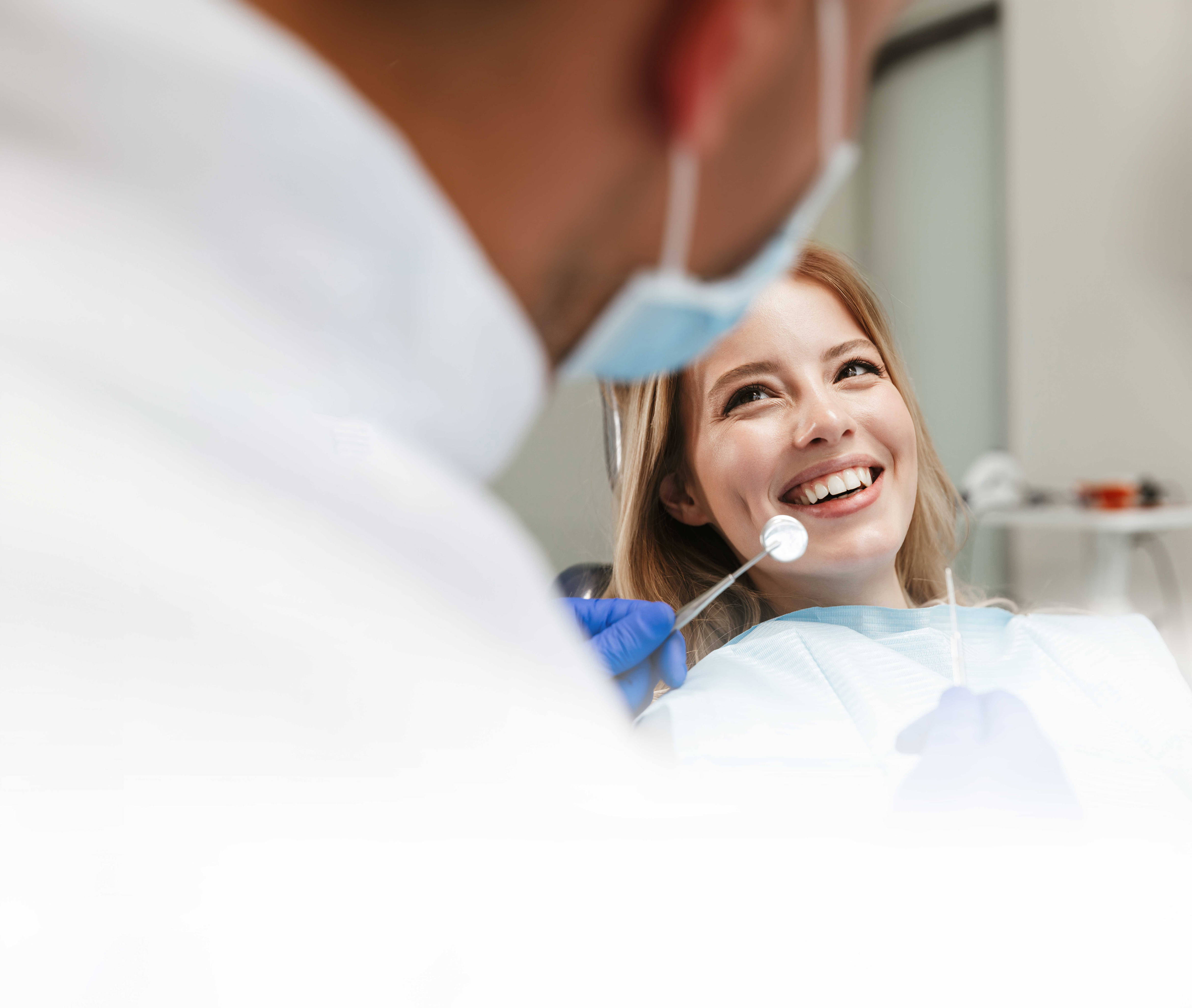 Woman Smiling at Dentist